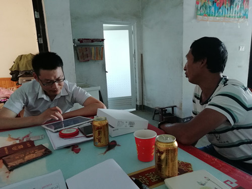 信用社章经理入户为贫困户办理